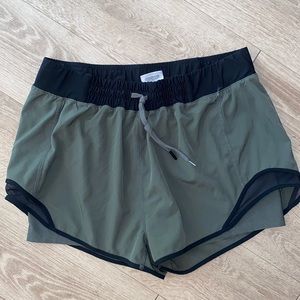 Athletic shorts with build in compression shorts